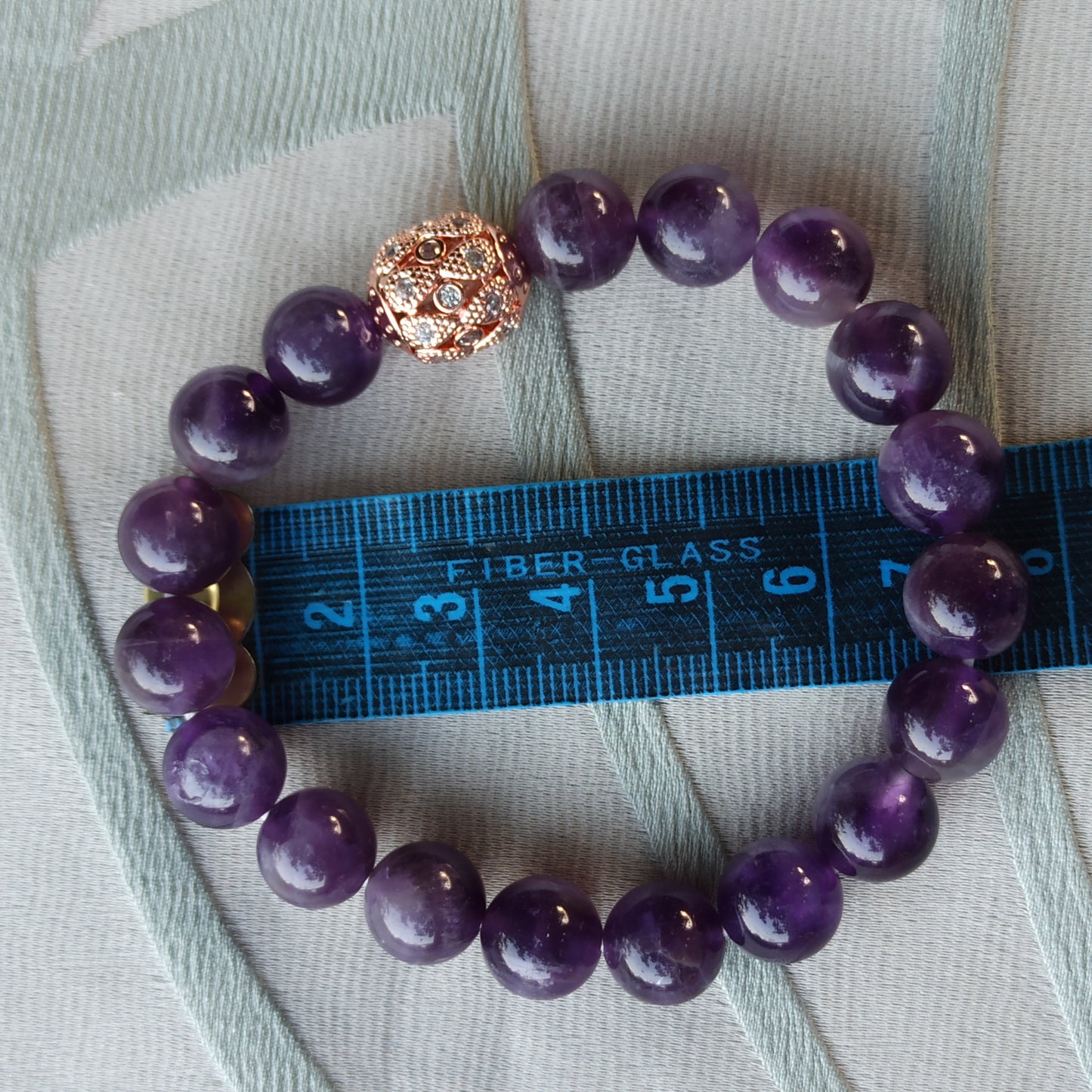 Respiro d’Ametista – Bracelet with amethyst and decorated copper