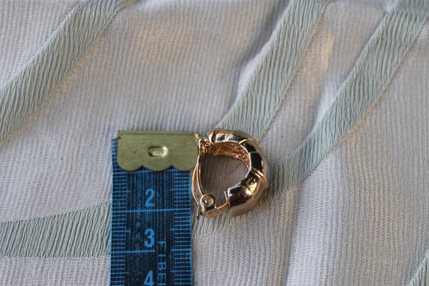 Sigillo del Sole - Vintage gold-tone metal earrings from the 1970s
