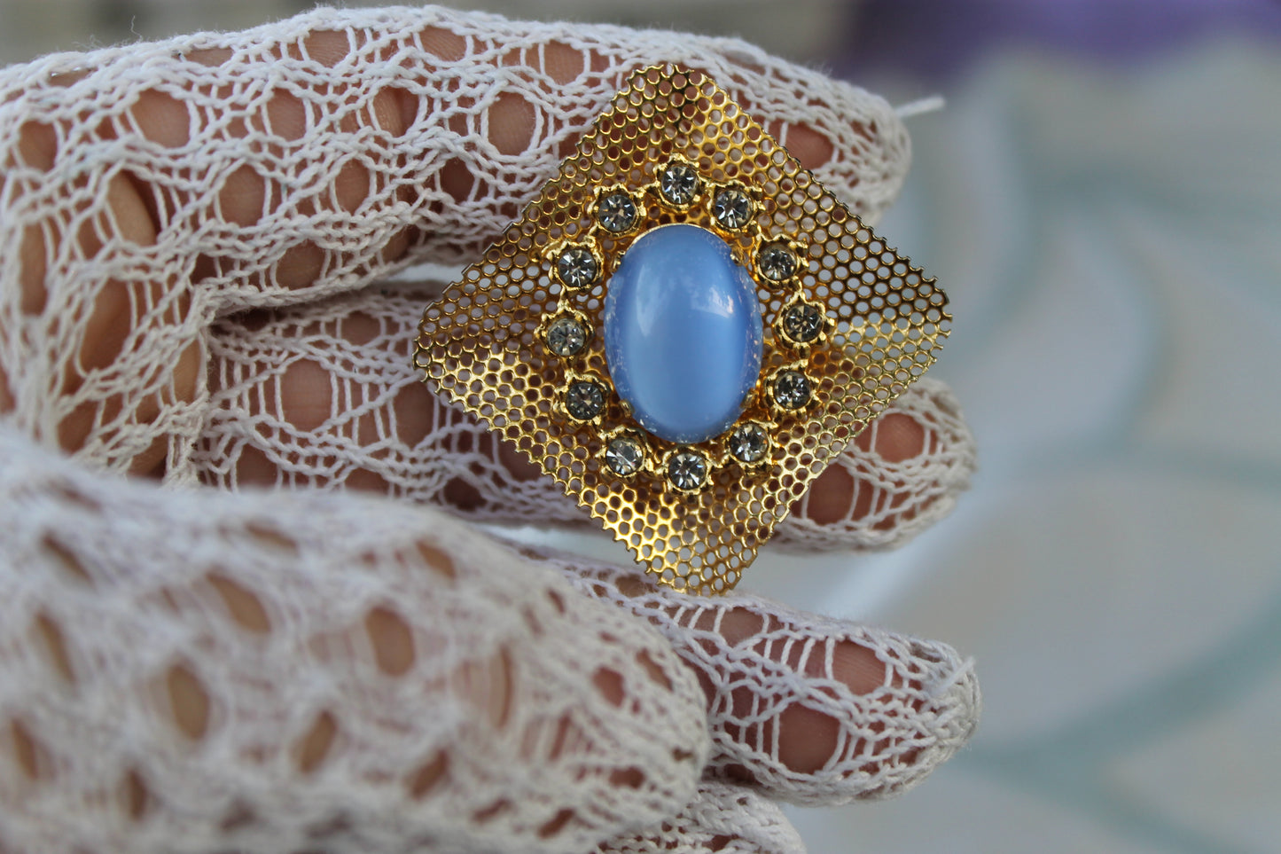 Reticolo di Luce - Vintage 1960s gold-tone metal earrings with light blue cabochon