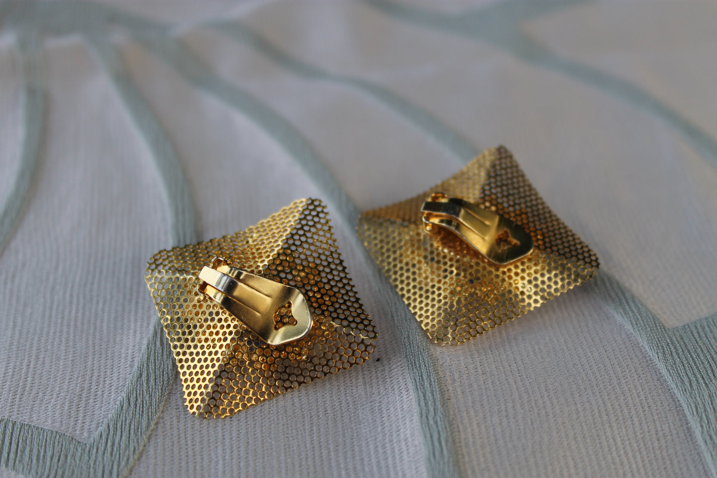 Reticolo di Luce - Vintage 1960s gold-tone metal earrings with light blue cabochon