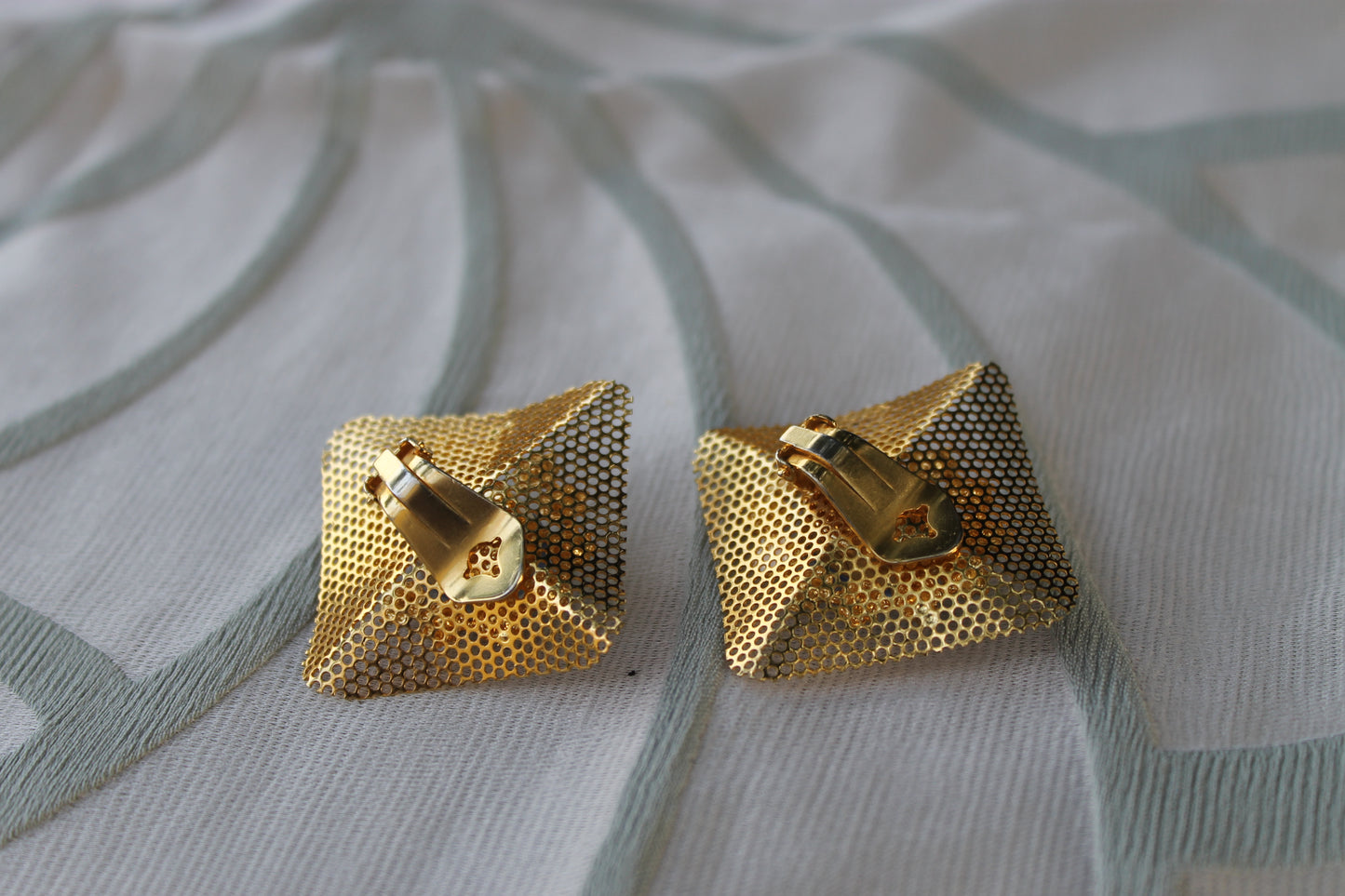 Reticolo di Luce - Vintage 1960s gold-tone metal earrings with light blue cabochon