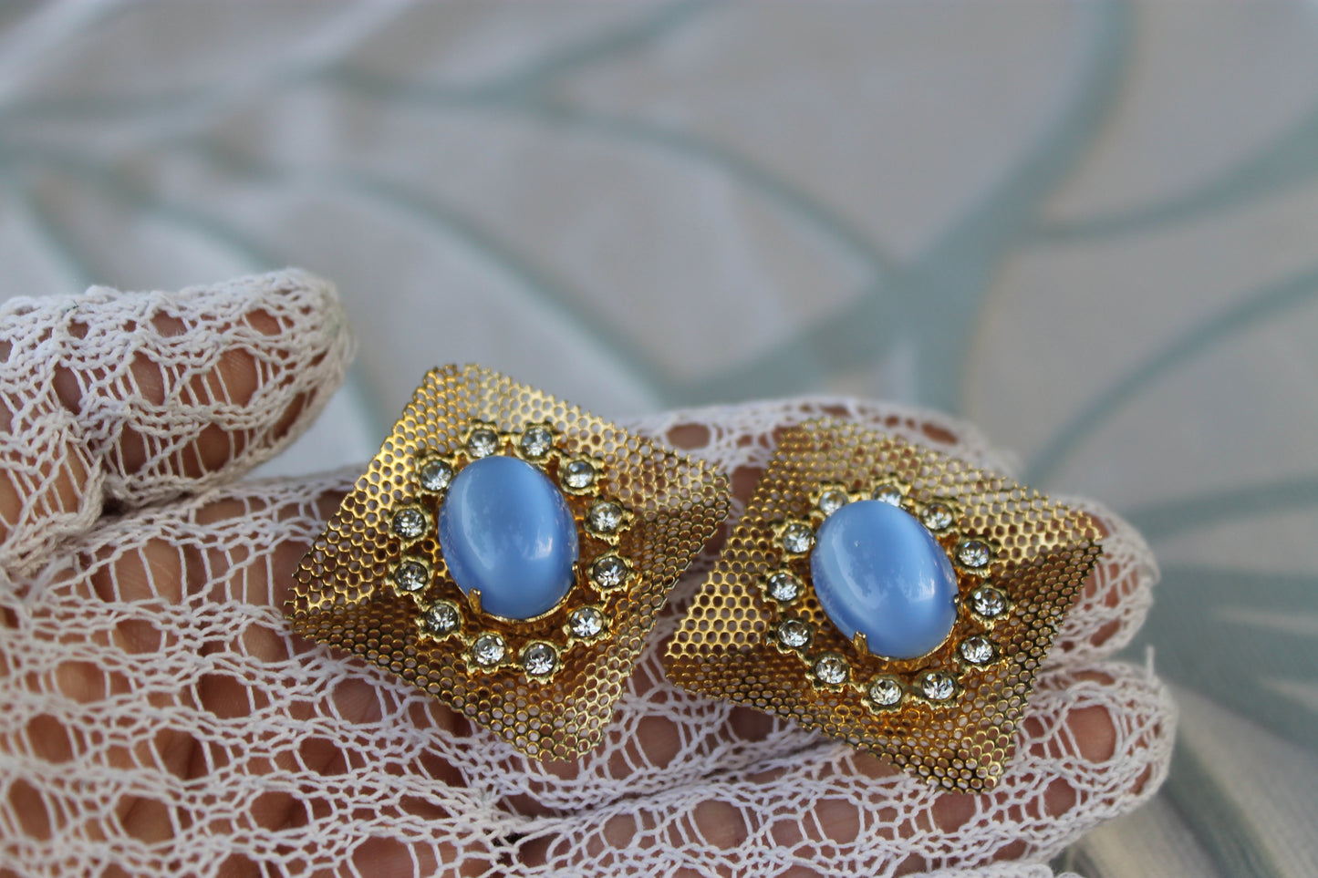 Reticolo di Luce - Vintage 1960s gold-tone metal earrings with light blue cabochon
