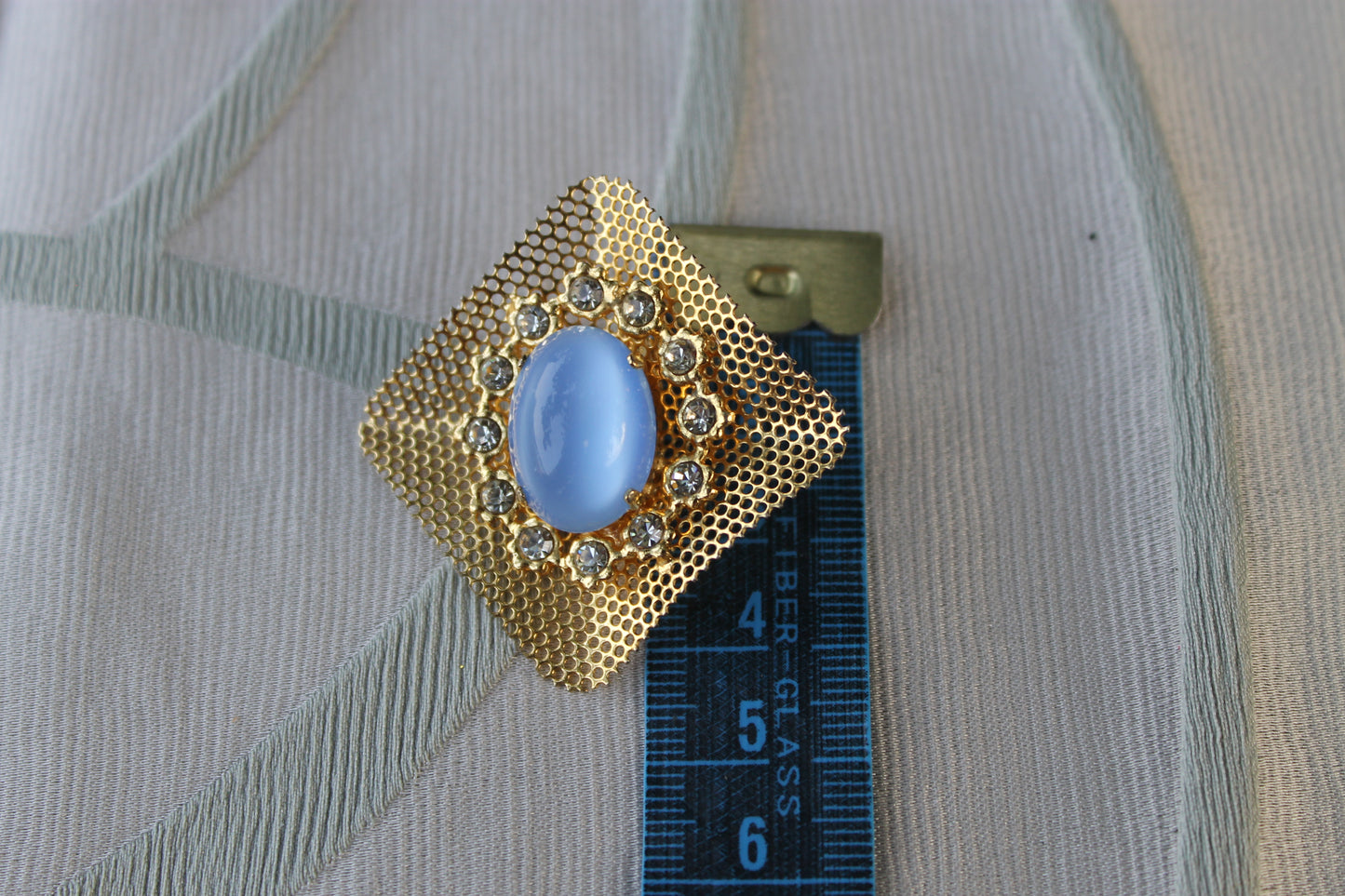 Reticolo di Luce - Vintage 1960s gold-tone metal earrings with light blue cabochon