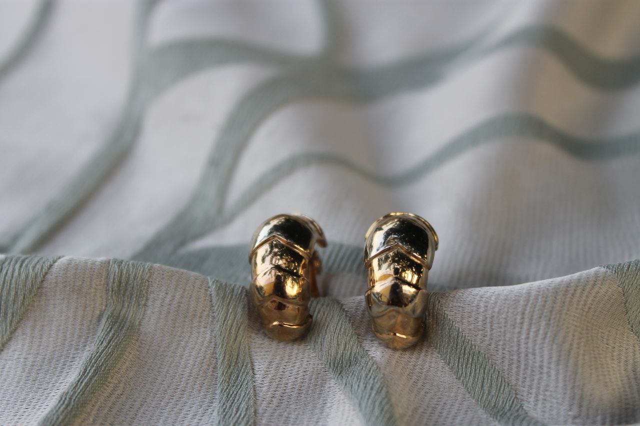 Sigillo del Sole - Vintage gold-tone metal earrings from the 1970s