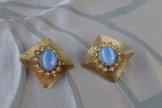 Reticolo di Luce - Vintage 1960s gold-tone metal earrings with light blue cabochon